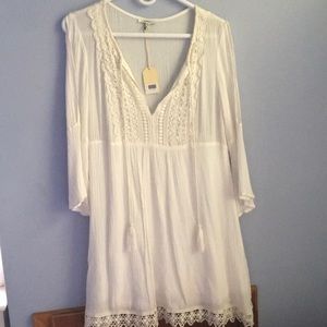 White dress with tassels